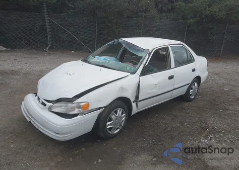 1998 Toyota Corolla Ce z USA, uszkodzony, nr VIN 2T1BR12E5WC037931
